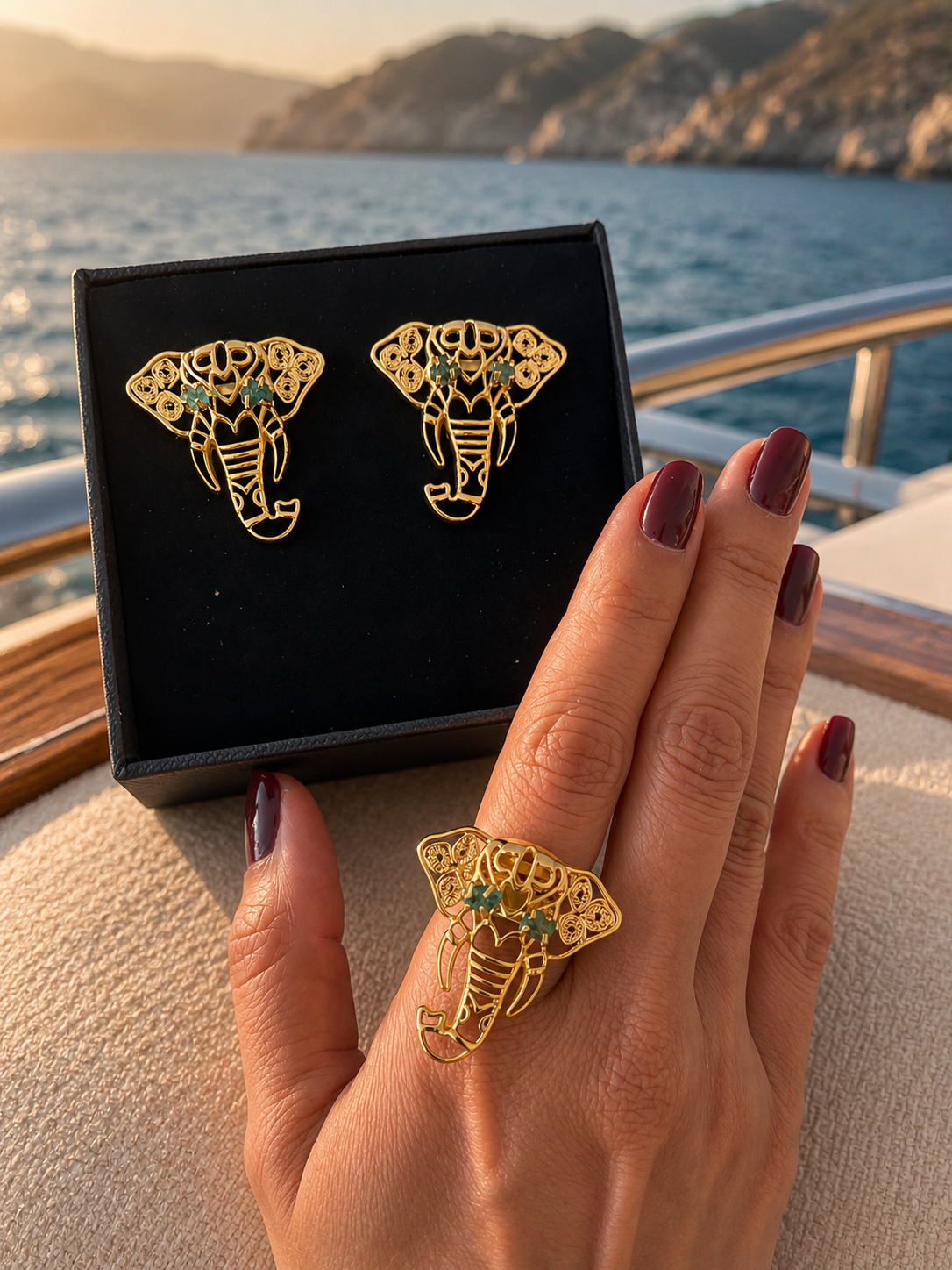 GANESHA EMERALD STUDS